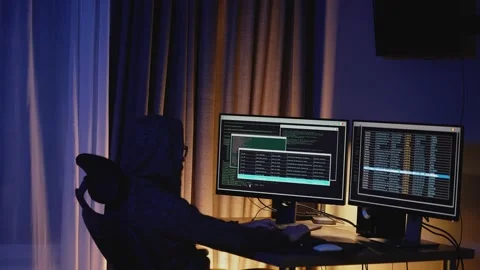 Night-time scene of a developer programming in low light. Сyber defense. Stock Footage 313402478