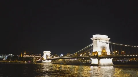 Night time side view of chain bridge in budapest Stock Footage 121553666