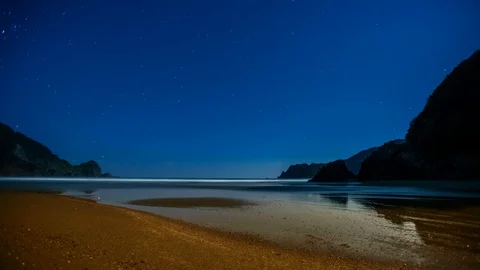 Night time time lapse at beach with stars Stock Footage 124571281