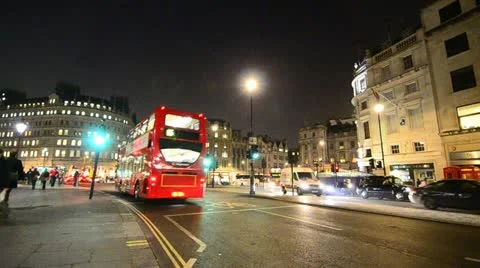 Night time traffic at trafalgar square, London Stock Footage 12561095