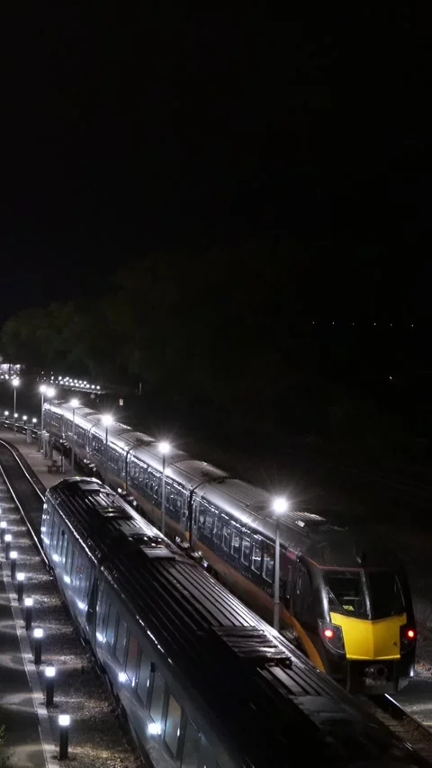 Night Time Train Yard from High Viewpoint Vertical Stock Footage 321951132