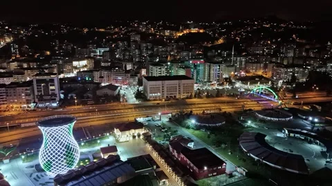 Night time view of a city with a bridge and a building Stock Footage 268914804