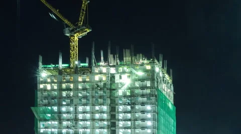 Night time view of High building Construction site. Timelapse. Vídeo Stock 61236913