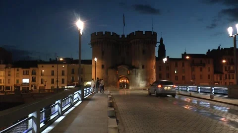 Night time view of the the Porte Chaussée on the River Meuse in Verdun, France. Stock Footage 45807940
