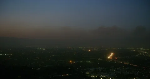 Night time view of smoke from fire in the hills of Los Angeles county, Stock Footage 99147290