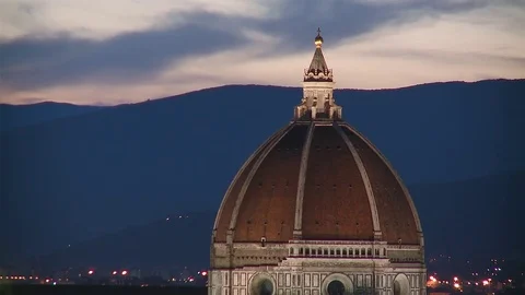 Night time zoom out from dome to a Roof top view of the  Florence Duomo, Stock Footage 74793862