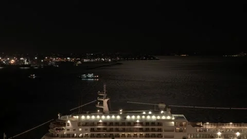 Night Timelapse of Bosphorus in Moonlight with a Big Cruise Ship in Foreground Stock Footage 208446361