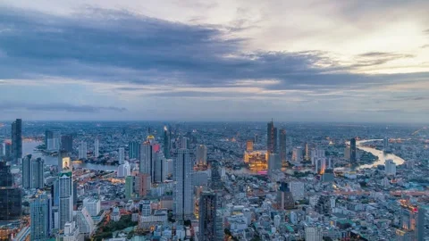 Night timelapse of Chao Phraya River, Bangkok with busy ferries and vibrant city Stock-Footage 325657440