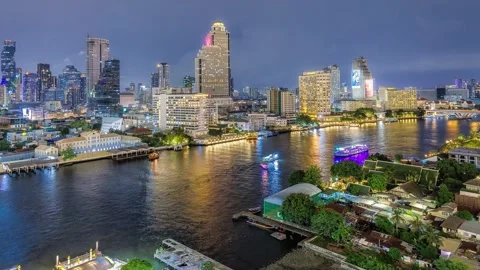 Night Timelapse of Chao Phraya River, Bangkok with Busy Ferries and City Skyline Video stock 325658118