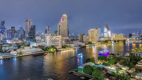 Night Timelapse of Chao Phraya River, Bangkok with Busy Ferries and City Skyline Stock Footage 325658460