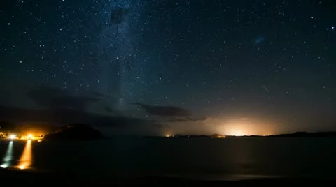 Night timelapse - Clearing clouds reveal Milky Way Stock Footage 21345644