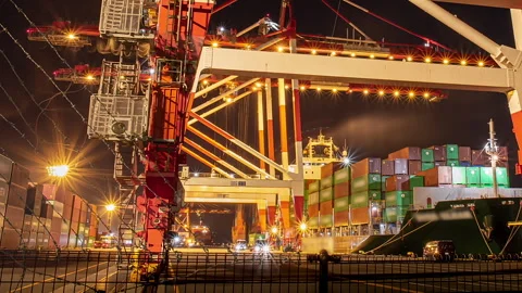 Night timelapse of container ship loading at Tokyo port Stock Footage 341611121