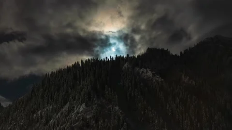 Night Timelapse of Crescent Moon with Fast Moving Storm Clouds Stock Footage 328960456