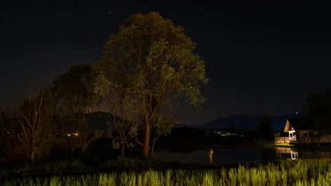 Night timelapse of distant mountains and stars in Hod, Chiang Mai, Thailand Stock Footage 229141416