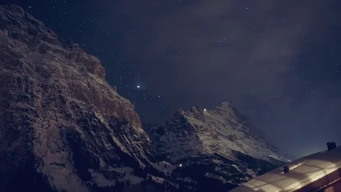 Night Timelapse Eiger Mönch Jungfrau Swiss Mountains with Snow, Ice, Stars Stock Footage 75069843