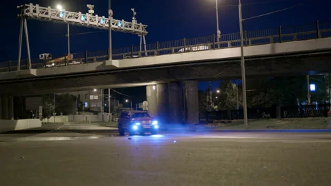 Night timelapse of highway with bridge over it. Many cars with low beam Stock Footage 201821089