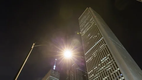 Night Timelapse hyperlapse of Chicago skyscraper with street light pole Stock Footage 96234916
