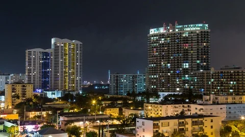 Night Timelapse hyperlapse of luxury skyscraper buildings in Miami Beach Stock Footage 100840794