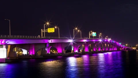Night timelapse hyperlapse of purple I-195 bridge going to Miami Beach Stock Footage 100840649