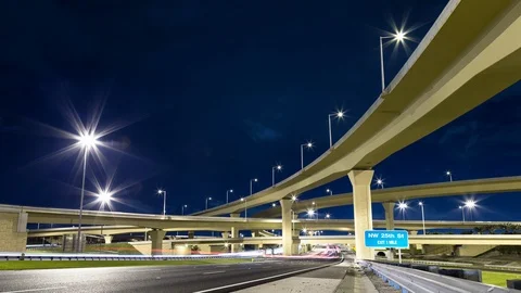 Night timelapse of I-95 highway interchange bridge and traffic, Miami Stock Footage 100870529