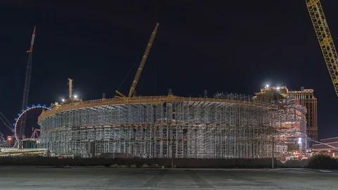 Night timelapse of MSG Sphere under construction in Las Vegas with cranes, truck Stock Footage 122648261