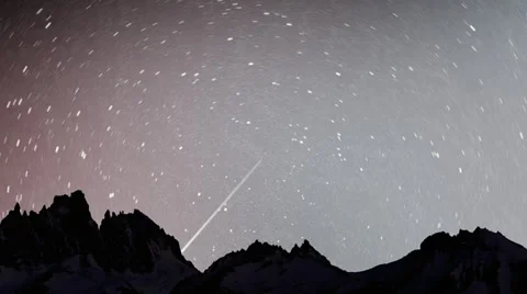 Night Timelapse Over Mountain Range with Shooting Star Stock Footage 39153171