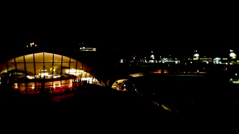 Night Timelapse overlooking TWA Hotel &amp; JFK International Airport Stock Footage 142158363