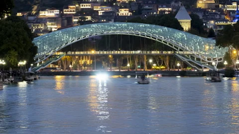 Night timelapse of pedestrian bridge of Peace across Kura River Stock Footage 292306949