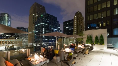 Night timelapse on skyscraper rooftop bar in Chicago downtown Stock Footage 96267354