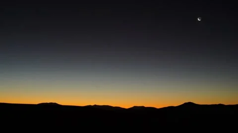 Night timelapse: a thin moon setting Stock Footage 278312407