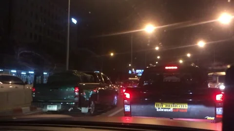 Night Traffic at Asoke Intersection with Pickup Trucks and Street Lights Stock Footage 334795087