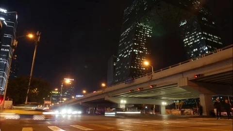 Night Traffic Beijing CBD with CCTV Headquarters in Background 4K Timelapse Video stock 80981334