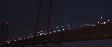 Night traffic on the bridge in Lisbon Stock Footage 150835029