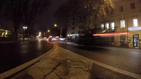 Night traffic on the corner back view, old city timelapse Stock Footage 73547191
