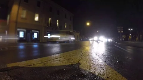 Night traffic on the corner front view, old city timelapse Stock Footage 73547097