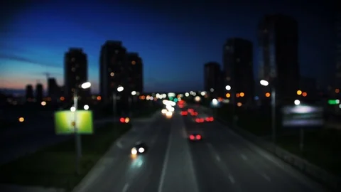 Night Traffic High Way into bokeh Stock Footage 77184567