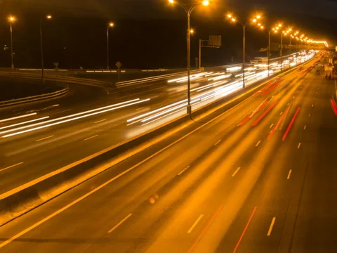 Night traffic on highway Stock Footage 74976536