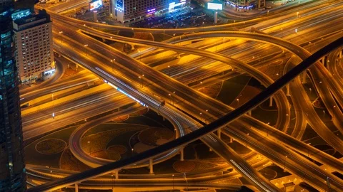 Night traffic Highway junction time-lapse UAE. zoom out Stock Footage 124023858