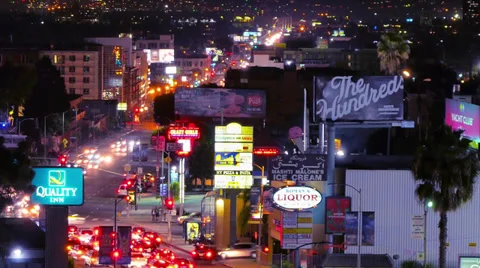 Night traffic on the intersection of La Brea Ave and Sunset Blvd in  Hollywood