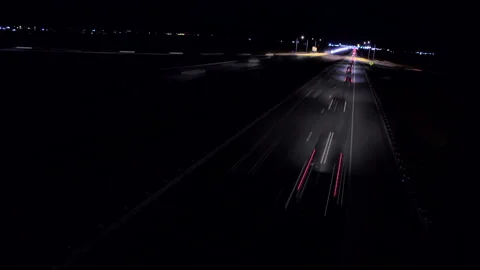 Night traffic on Interstate 15 in eastern Idaho on the way to Yellowstone Park Stock Footage 199711166