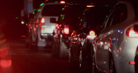 Night traffic jam with long row of cars, illuminated by red brake lights an.. Stock Footage 318084369