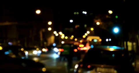 Night traffic light out of focus colourful bokeh cars city lights shining glow Stock Footage 273406781