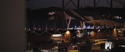 Night traffic next to the train station Stock Footage 151358744