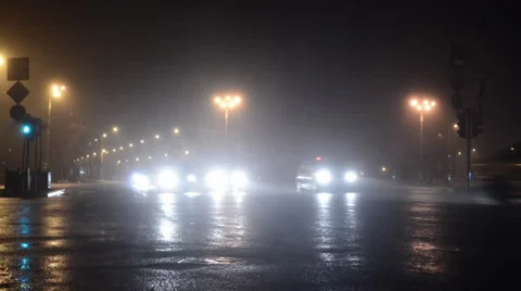 Night Traffic in Rain Stock Footage 27522664