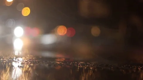 Night traffic on a rainy evening Stock Footage 72382456