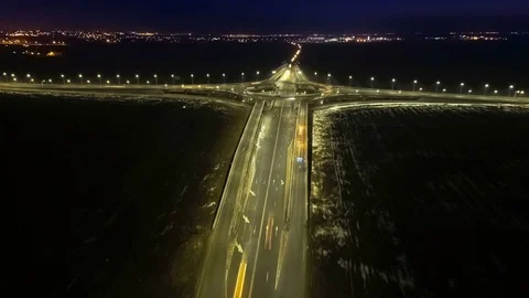Night traffic on the road crossing Stock Footage 72745125