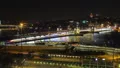 Night traffic speeds in metropolis, illuminated city, blurred lines, busy life HD Footage