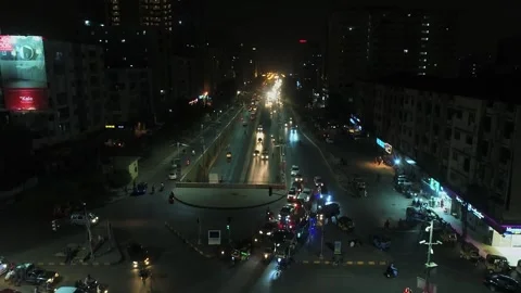 Night Traffic at Tariq Road Intersection, Karachi (Editorial - May 26, 2026) Stock Footage 335699814