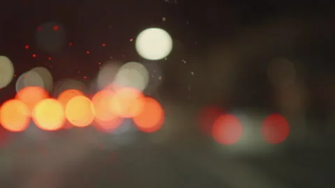 Night traffic view through the car front window, street lights, bokeh effect Stock Footage 244797468