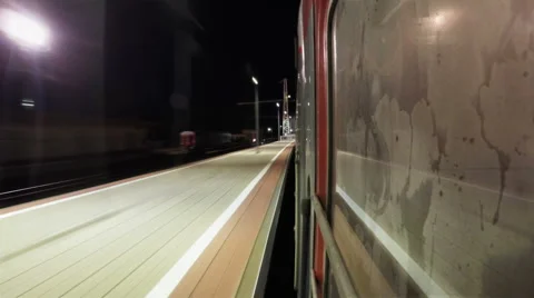 Night train arrives at the platform. Timelapse Stock Footage 63313679